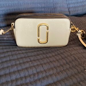 Marc Jacobs cross body beige, cream and black cross body.
